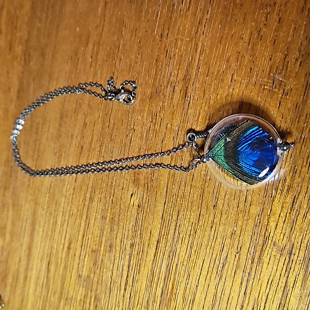 ❄️3 for $20❄️Peacock in a bottle